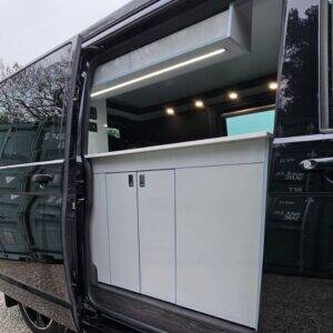 Campervan kitchen for VW Transporters with twin sliding doors.